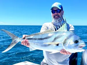 Alex holding a roosterfish inshore in Costa Rica
