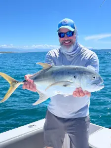 Angler with a jack crevalle caught inshore in Costa Rica