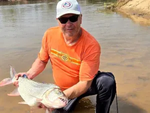 An angler with a tigerfish in Tanzania