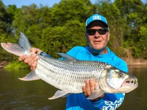 An angler with a tigerfish in Tanzania
