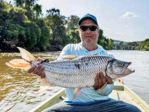 An angler with a tigerfish in Tanzania