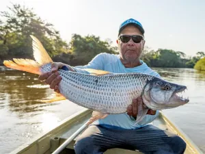 An angler with a tigerfish in Tanzania